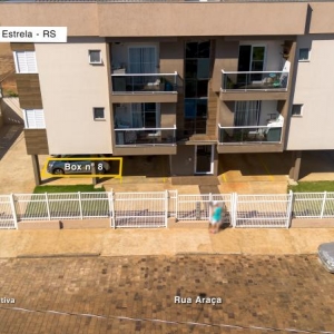 LOTE 001 - Apartamento nº 203 com área de 50,54m² + BOX nº 8 com área 14,68m², localizados na Rua Araçá, nº 717, bairro Pinheiros, Estrela/RS