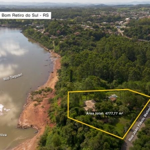 LOTE 011 - Área de 4.777,77m², contendo uma casa residencial de alvenaria com aproximadamente 300,39m², um quiosque de 38,40m² fechado com madeiras rústicas e duas piscinas, situado na Rua João Flávio Mallmann, n° 209, bairro Goiabeira, Bom Retiro do Sul/RS