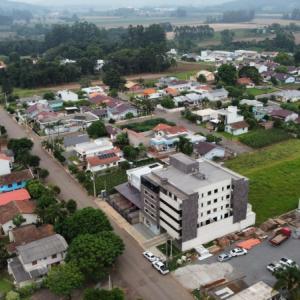 LOTE 001 - Apartamento n° 502 com área real privativa de 174,42m² + Box de Estacionamento n° 103 com área real privativa de 33,83m²,  localizados no Edifício Solar de Fátima, sito a Rua 21 de Abril, n° 398, Roca Sales/RS