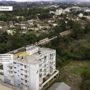 LOTE 002 - Apartamento 407 do Edifício Comercial e Residencial Coliseu, no quarto andar, com a área real privativa de 51,94m², localizado na Rua Coronel Müssnich, n° 04, bairro Centro, Estrela/RS