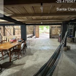LOTE 001 - Área de 101.640,00m², contendo uma casa residencial em alvenaria e dois galpões em madeira, situada na estrada secundaria a Rua José Francisco Algaier, Picada São Bento, Santa Clara do Sul/RS