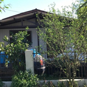 LOTE 09 - Um terreno, onde foi construído um chalé e uma ampliação em alvenaria, sito na Rua Aratiba, nº 189