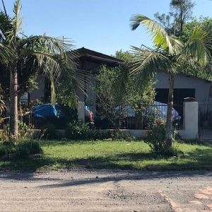 LOTE 09 - Um terreno, onde foi construído um chalé e uma ampliação em alvenaria, sito na Rua Aratiba, nº 189