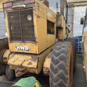 LOTE 007 - Máquina Motoniveladora Huber Warco, modelo M.A./HUBER-WARCO, ano de fabricação 1986, placa IIK8250