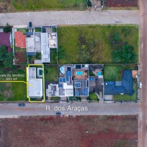 LOTE 001 - Área de 360,00m², edificada uma casa residencial em alvenaria de 377,62m² e uma piscina residencial em fibra com 13,71m², localizada na Rua dos Araçás, nº 243, bairro Montanha, Lajeado/RS