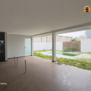 LOTE 001 - Área de 360,00m², edificada uma casa residencial em alvenaria de 377,62m² e uma piscina residencial em fibra com 13,71m², localizada na Rua dos Araçás, nº 243, bairro Montanha, Lajeado/RS