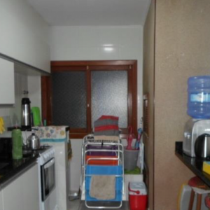 LOTE 001 - Apartamento n° 402 com a área real privativa de 75,78m² + Box n° 07 com a área real privativa de 14,16m², localizados no Edifício Athenas, sito à Rua Guaraci, n° 1521, Zona Nova de Capão da Canoa/RS