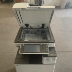 LOTE 002 - Uma impressora multifuncional Laser Super A3, marca RICOH MP C2003