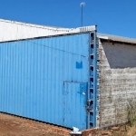 LOTE 004 - Uma estrutura metálica denominada HANGARETE, com medidas 14,70mX15,20m, com piso de concreto, alvenaria e portões.